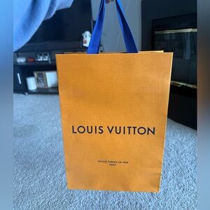 Louis Vuitton Vibrant Orange Bag with Blue Handles